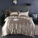 Summer Simple Pure Color Ice Silk Bed Linen Quilt Cover Bedding in champagne gold on a stylish bed.