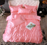 Bed Sheet Quilt Cover Naked Sleep Cool Silk Single Three Piece Set in pink with decorative pillows.