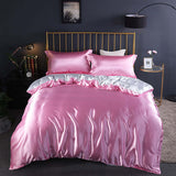 Summer Simple Pure Color Ice Silk Bed Linen Quilt Cover Bedding in pink and white on a stylish bed.