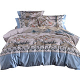 Fashionable high-end satin duvet cover set with pastoral plant printing and decorative pillows.