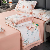 Cotton and linen double-layer summer blanket and four-piece bed set with floral design on bed