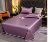 Ice Silk Bed Sheet Quilt Cover Pillowcase set in solid purple color with a smooth finish, enhancing bedroom decor.