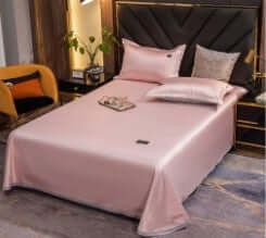 Pink ice silk bed sheet quilt cover and pillowcase set showcasing a cool feeling and solid color design.
