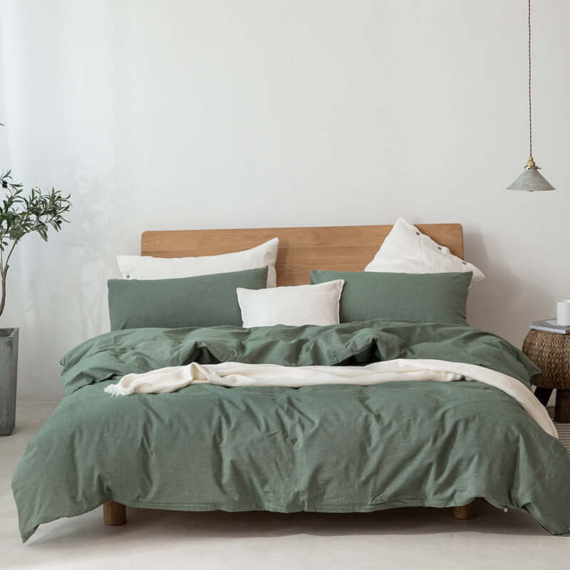 Japanese-style bedding with pure color lattice duvet cover and pillows in a modern bedroom setting.