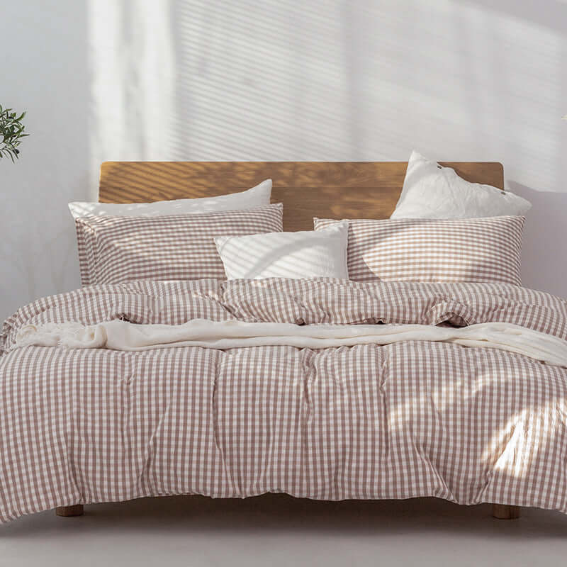 Japanese Style Muji-style Bed And Breakfast Pure Color Lattice Duvet Cover with Pillows in Cozy Bedroom Setting.