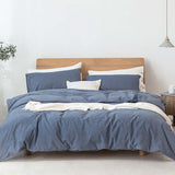 Japanese Style Muji-style bed with blue duvet cover and pillows, modern simple design for single or double beds.