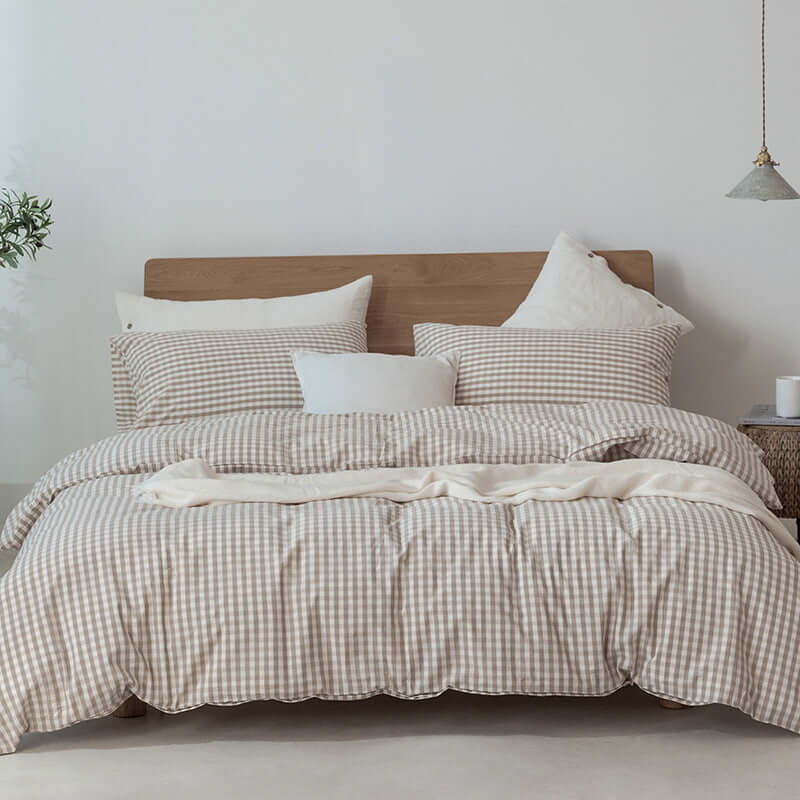 Japanese Style Muji-style Bed with Pure Color Lattice Duvet Cover and Bed Sheet in a modern bedroom setting.
