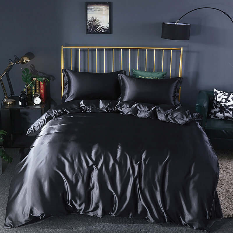Summer Simple Pure Color Ice Silk Bed Linen Quilt Cover Bedding in elegant black color with ruffled edges and matching pillowcases.