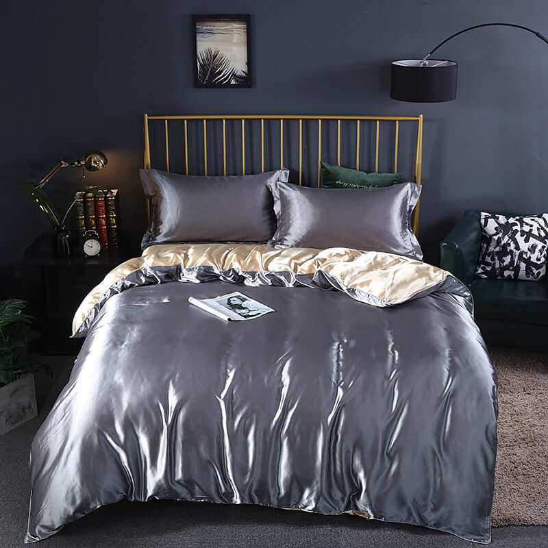 Summer Simple Pure Color Ice Silk Bed Linen Quilt Cover Bedding in gray with matching pillows on a stylish bed.