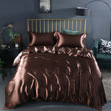 Summer Simple Pure Color Ice Silk Quilt Cover in rich brown hue with matching pillows, enhancing elegant bedroom decor.