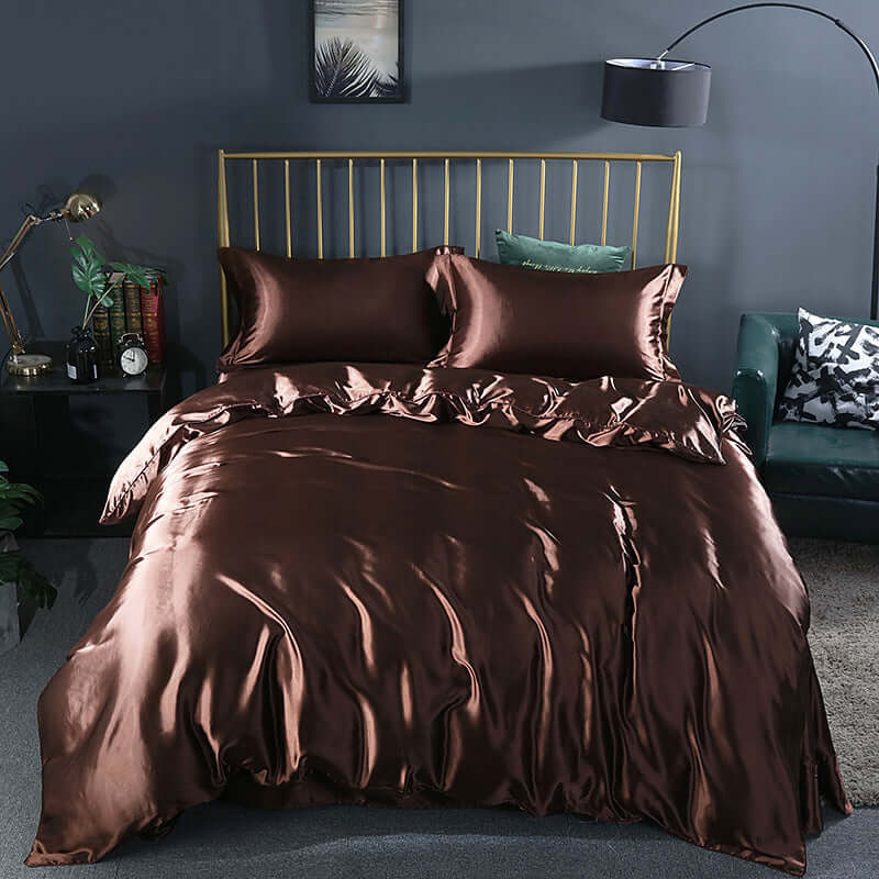 Summer Simple Pure Color Ice Silk Quilt Cover in rich brown hue with matching pillows, enhancing elegant bedroom decor.
