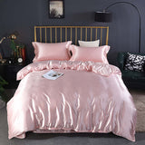 Summer Simple Pure Color Ice Silk Bed Linen Quilt Cover Bedding in soft pink color on a stylish bed.