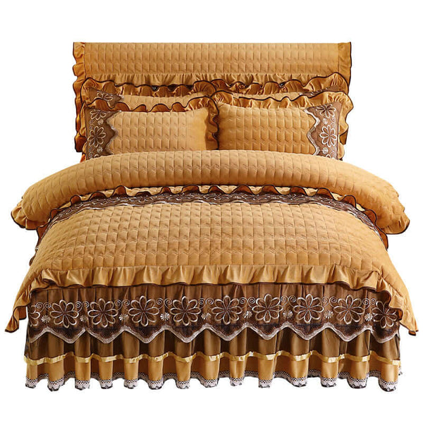 European Style Quilted Thick Plus Velvet Duvet Cover Bed Skirt Four-piece Suit in warm tones with floral embroidery.