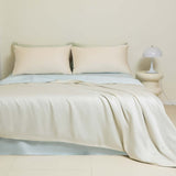 Washed Ice Silk Solid Color Silky Sleep Naked Bed Sheet and Quilt Cover on a modern bed setup.