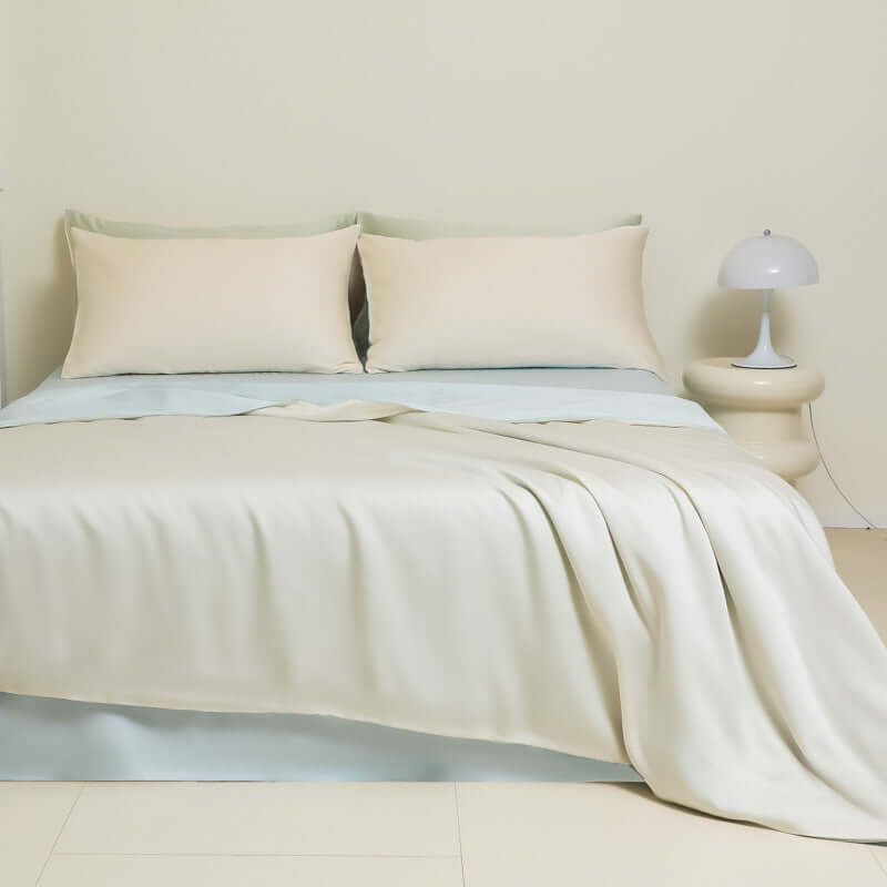 Washed Ice Silk Solid Color Silky Sleep Naked Bed Sheet and Quilt Cover on a modern bed setup.