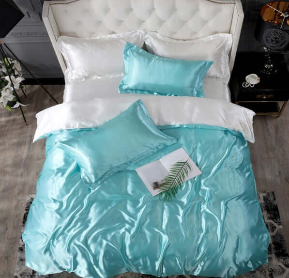 Bed Sheet Quilt Cover Naked Sleep Cool Silk Single Three Piece Set in elegant teal color with decorative pillows.