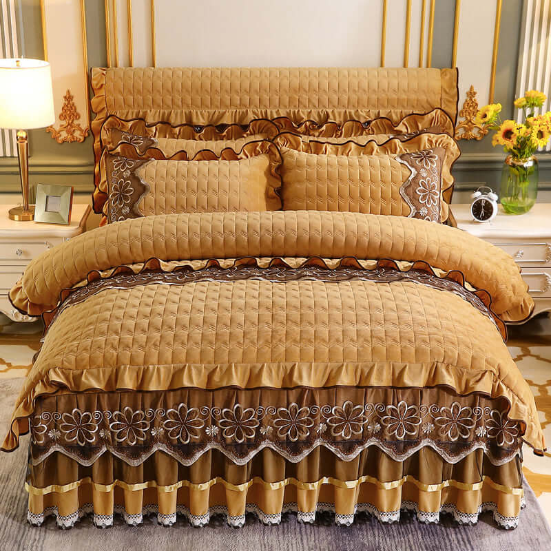 European Style Quilted Thick Plus Velvet Duvet Cover Bed Skirt Four-piece Suit in warm golden tones.