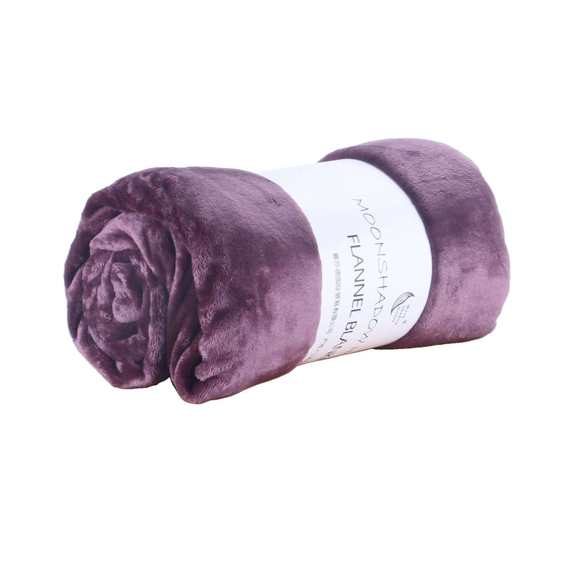 Rolled flannel blanket in purplish hue, perfect for air-conditioning and cozy naps.