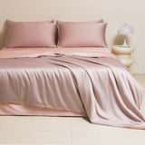 Washed Ice Silk Solid Color Silky Sleep Naked Bed Sheet with matching pillow covers in soft pink shade.