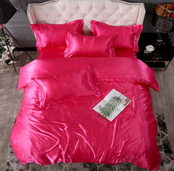 Bright pink silk Bed Sheet Quilt Cover Naked Sleep Cool Silk Single Three Piece Set with matching pillows.