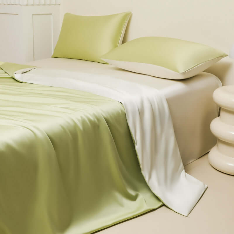Washed Ice Silk Solid Color Silky Sleep Naked Bed Sheet and Pillow Covers in pastel green and white.