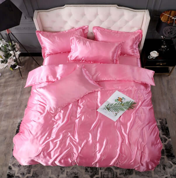 Bed Sheet Quilt Cover Naked Sleep Cool Silk Single Three Piece Set in vibrant pink, elegantly arranged on a stylish bed.