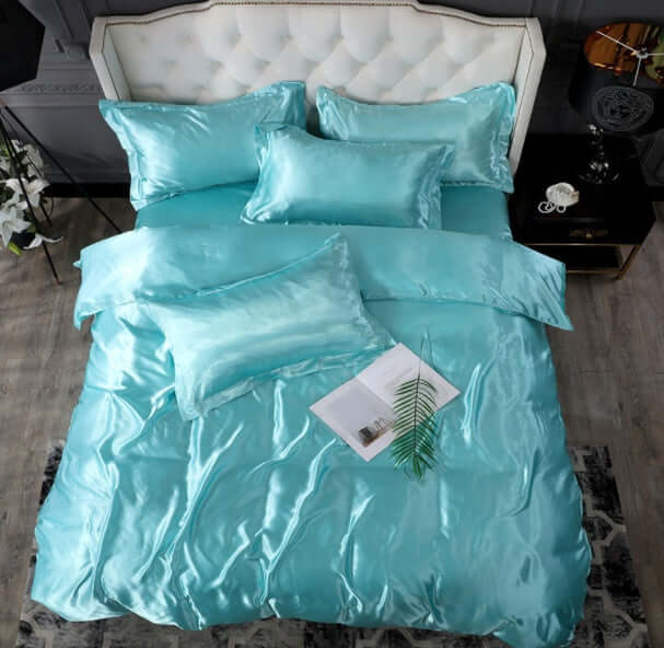 Bed Sheet Quilt Cover Naked Sleep Cool Silk Single Three Piece Set in elegant turquoise, featuring soft satin texture and decorative pillows.