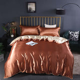Summer Simple Pure Color Ice Silk Bed Linen Quilt Cover Bedding in rich brown and cream colors on a stylish bed.