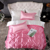 Bed Sheet Quilt Cover Naked Sleep Cool Silk Single Three Piece Set in pink with elegant satin finish and stylish pillows.