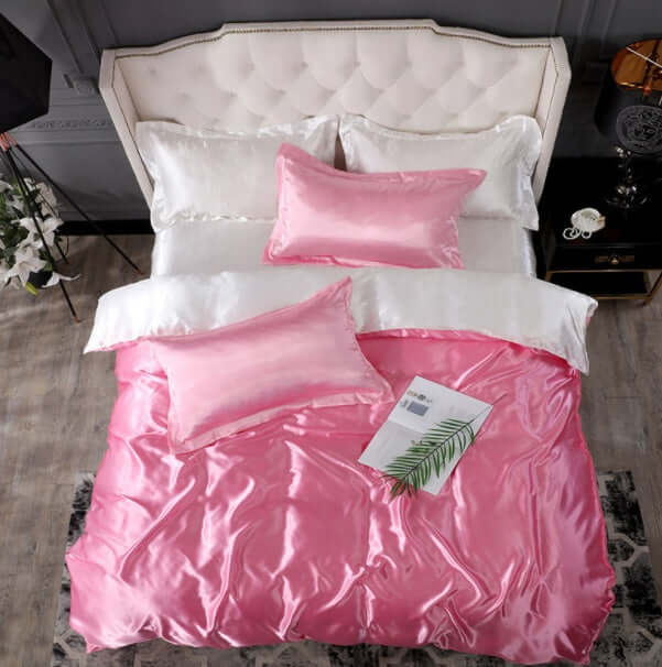 Bed Sheet Quilt Cover Naked Sleep Cool Silk Single Three Piece Set in pink with elegant satin finish and stylish pillows.